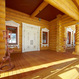 Резное крыльцо деревянного, рубленого дома